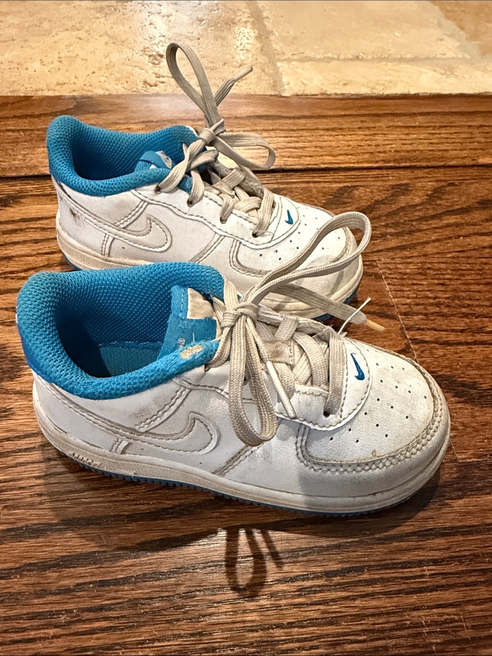 Nike Force 1 White and Blue Low-Top Sneakers with Aqua Blue Lining